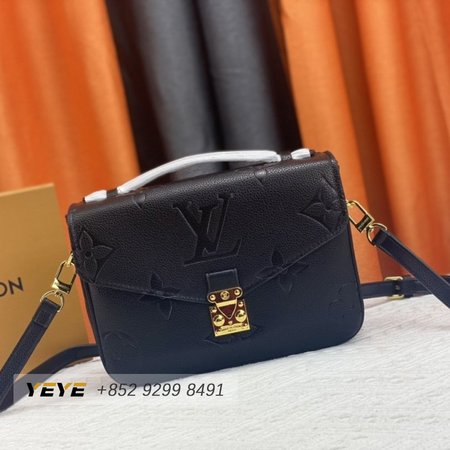 pochette metis black monogram empreinte leather with gold